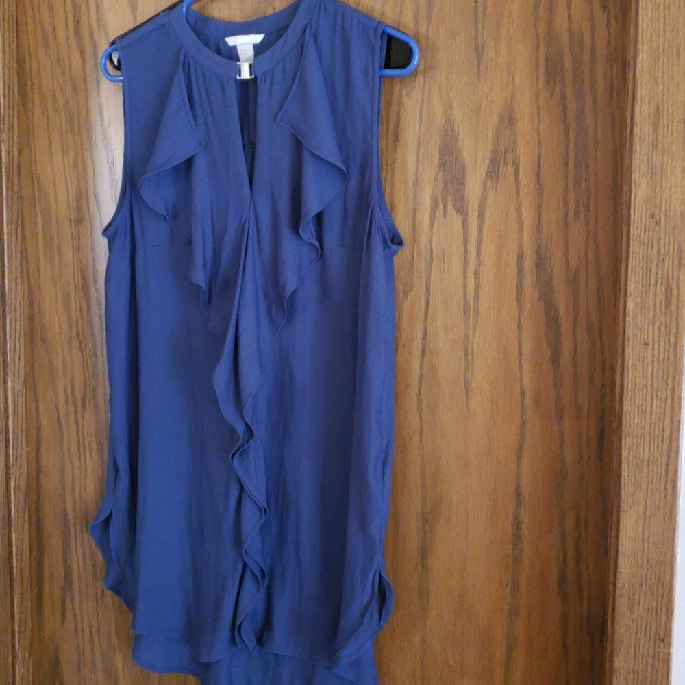 Sleeveless blouse with ruffles